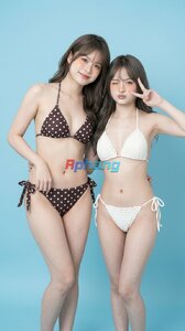 Two_women_in_bikinis_202605261326_19.jpeg